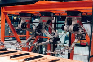 Motoman Robots Press Tending