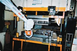 Motoman Robots Handling and Press Tending  Appliance Panels
