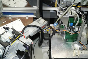 Motoman Robots Handling, Assembling, Testing and Packing